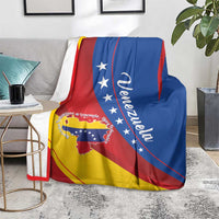 Venezuela flag throw blanket draped over seat, featuring stars, map patch, and curved text