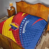 Venezuela themed quilt blanket on bed with red yellow blue diagonal stripes and star script