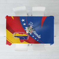 Venezuela flag tablecloth laid flat, blue and red halves with yellow diagonals and map
