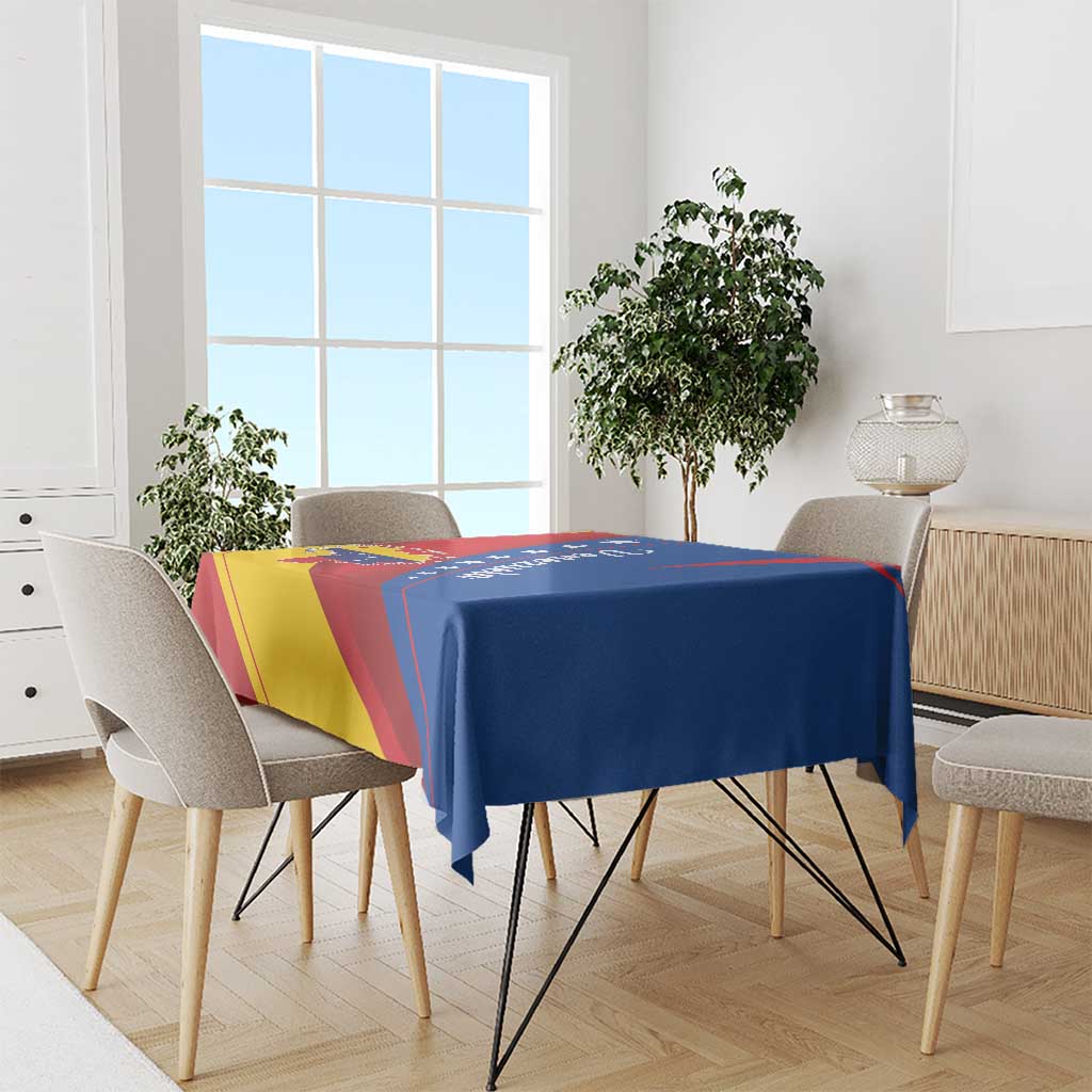 Venezuela flag print tablecloth over dining table, red yellow and blue with star accents