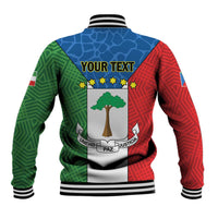 Colorful baseball jacket back with striped hem, tree crest, 'YOUR TEXT' and 'UNIDAD PAZ JUSTICIA'