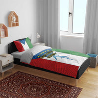 Colorful duvet cover and pillows with Equatorial Guinea graphic in red, blue, green