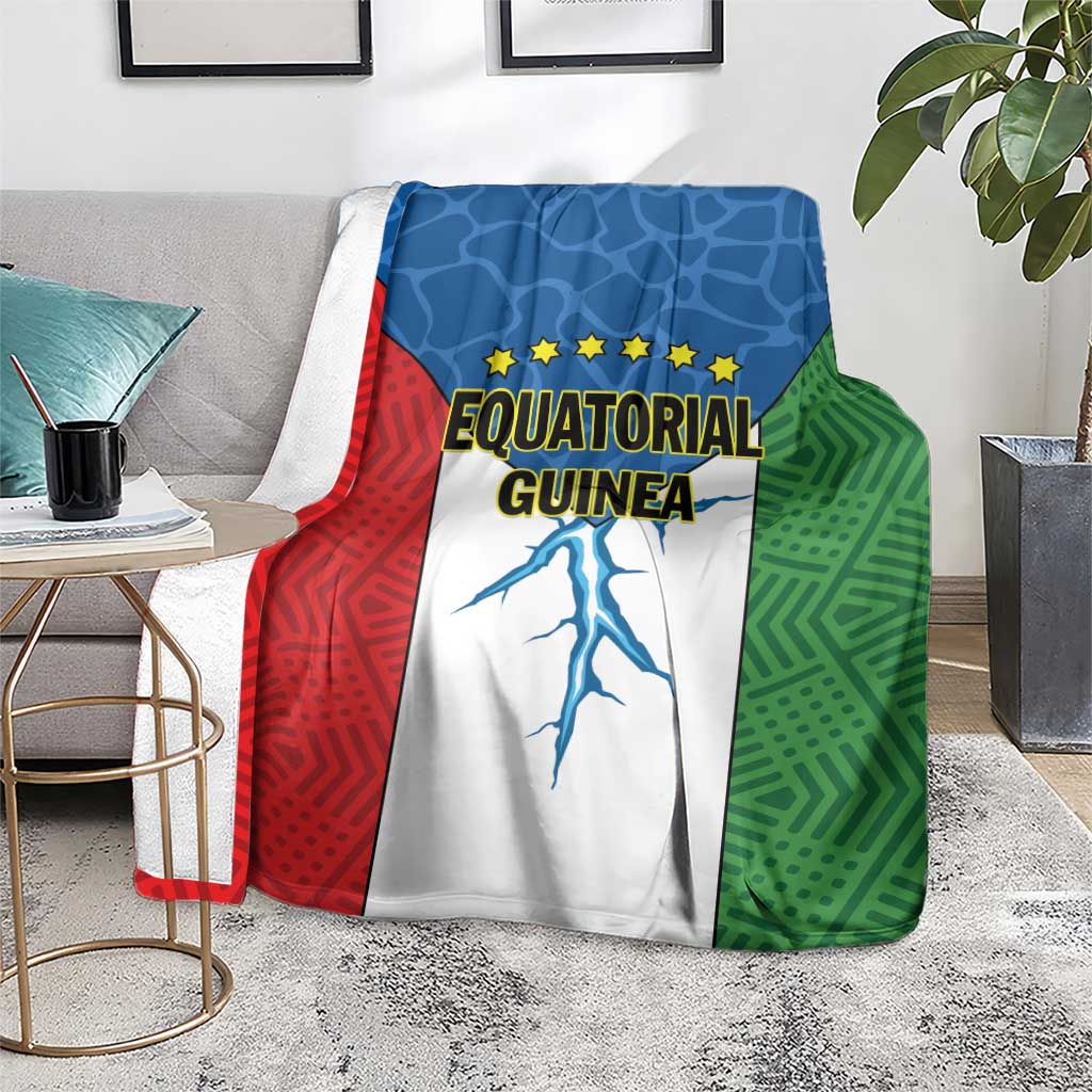 Equatorial Guinea flag blanket on sofa, red blue green panels with stars and country text