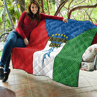Equatorial Guinea flag quilt stretched on seating, red/blue/green panels with emblem