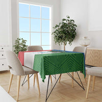 Colorful tablecloth on dining table, green side panel and red backing with blue accent