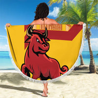 Round yellow beach blanket with red fighting bull graphic and fringe