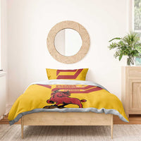 Yellow comforter with red chevrons, bull artwork, crown, and ESPANA on bed