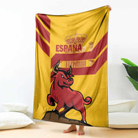 Spanish blanket with yellow background, bull graphic, and Spain flag design
