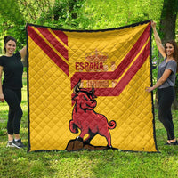 Quilted yellow Spain bull blanket with red trim and bull graphic