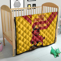Quilted yellow crib blanket with Spanish bull graphic and red stripe pattern