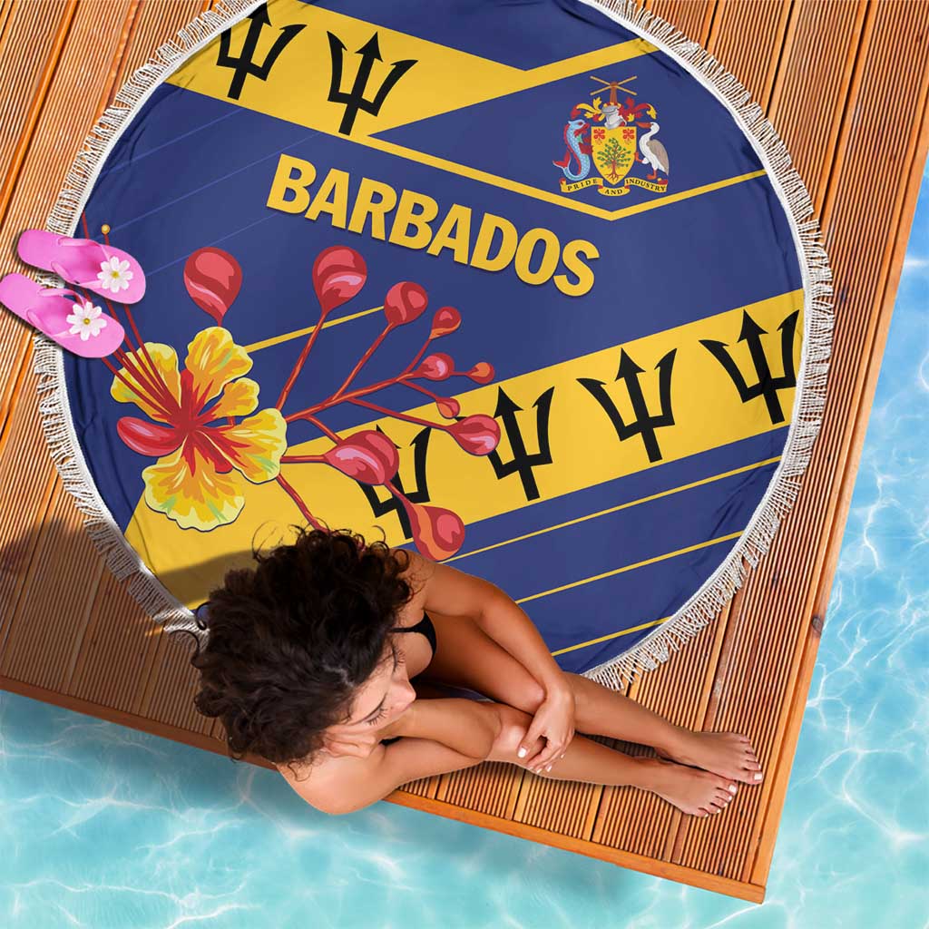 Round Barbados beach blanket with blue and yellow stripes, fringe edge, and flower crest design