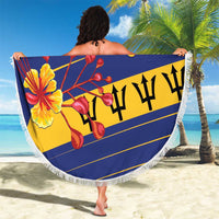 Round Barbados beach blanket held up: blue and yellow stripe design with fringe edge and flowers