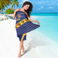 Blue sarong with yellow diagonal stripes, crest emblem, and Barbados text