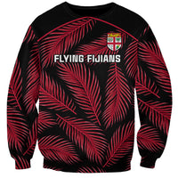 Black sweatshirt with red palm leaf print, Flying Fijians logo and crest