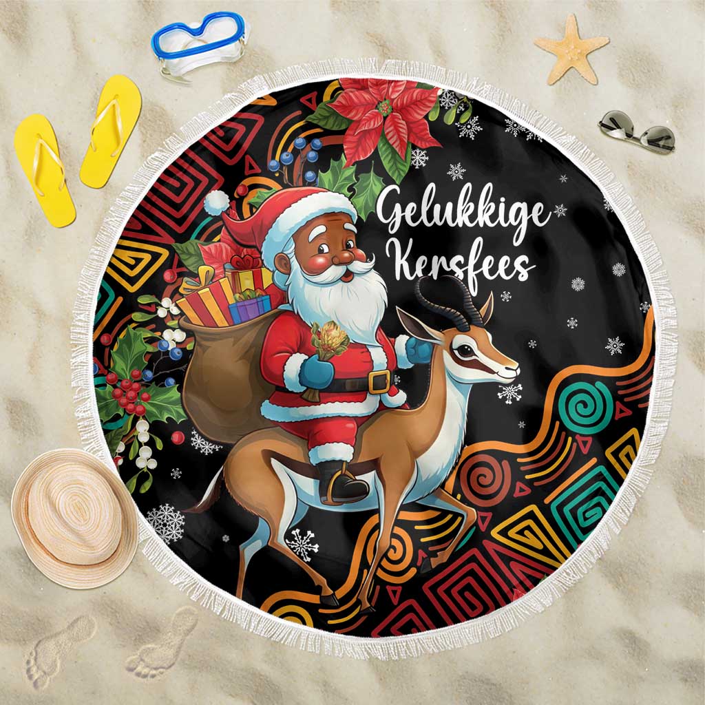 Round black beach blanket with Santa riding springbok, colorful pattern and white fringe.