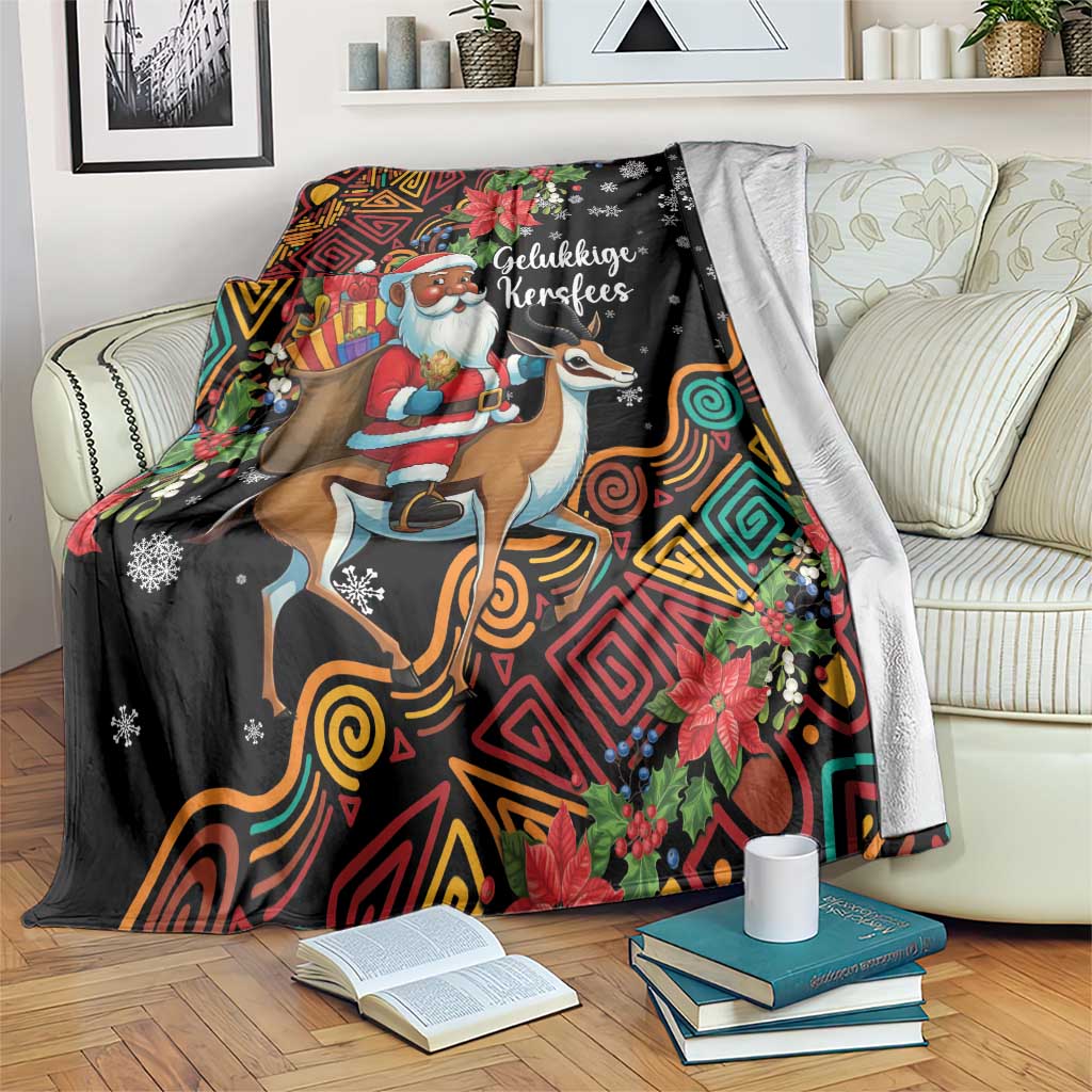 Black Christmas blanket with Santa riding a springbok and colorful geometric patterns