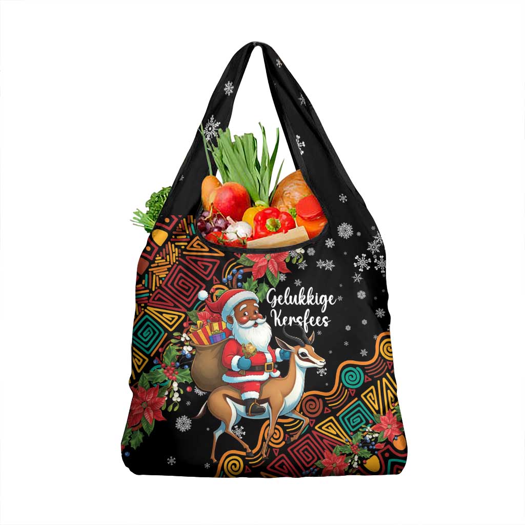 Black Christmas grocery tote bag with Santa riding springbok graphic and colorful patterns