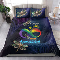Navy duvet and two pillowcases with dragonfly artwork and rainbow heart graphic