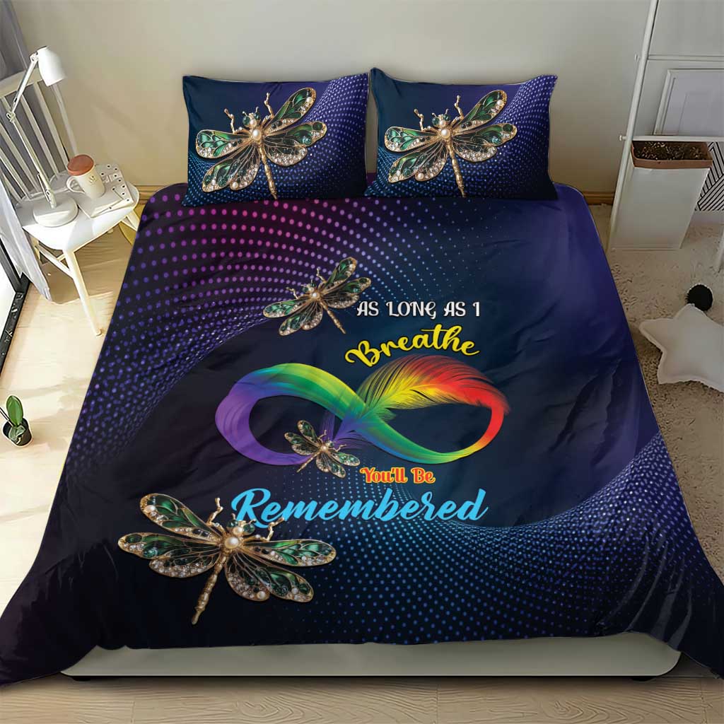 Navy duvet with dragonfly print and two matching pillowcases for a coordinated set