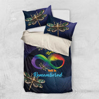 Navy bedding set with dragonfly motif, including duvet and two pillowcases