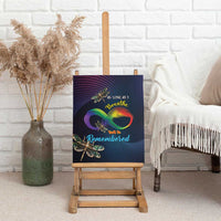 Canvas wall art on wooden easel with rainbow infinity feather and dragonfly accents.