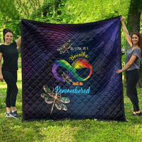 Navy diamond-quilted blanket with rainbow heart, dragonfly applique, and printed message