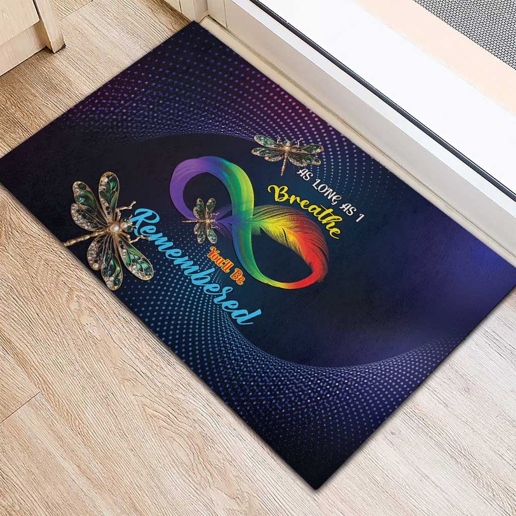 Colorful doormat with rainbow infinity heart, dragonfly icons, and Remembered script
