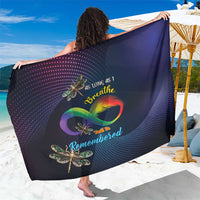 Navy infinity sarong with dotted pattern and colorful dragonfly/feather graphic