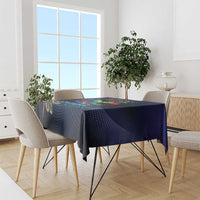 Navy tablecloth with multicolor dragonfly and infinity design, draped over dining table