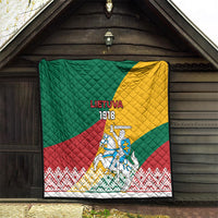 Lithuania Independence quilt displayed in a doorway with green, yellow, and red flag