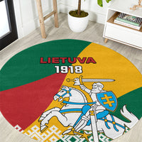 Round carpet with Lietuva 1918 text and knights emblem in green, red, and yellow