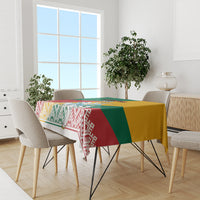 Flag-themed Lithuania tablecloth on a dining table, featuring bold bands and decorative border