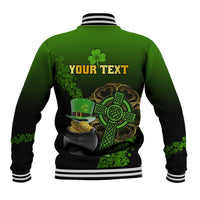 Green baseball jacket back with "YOUR TEXT" and ornate shamrock over cauldron