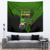 Green and black St. Patrick's Ireland tapestry featuring shamrock, hat and gold coins in cauldron