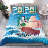 Blue bedding set with sailboat artwork, ocean waves, and two pillowcases
