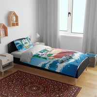 Blue bedding set with sailboat and waves design on bed with two matching pillowcases