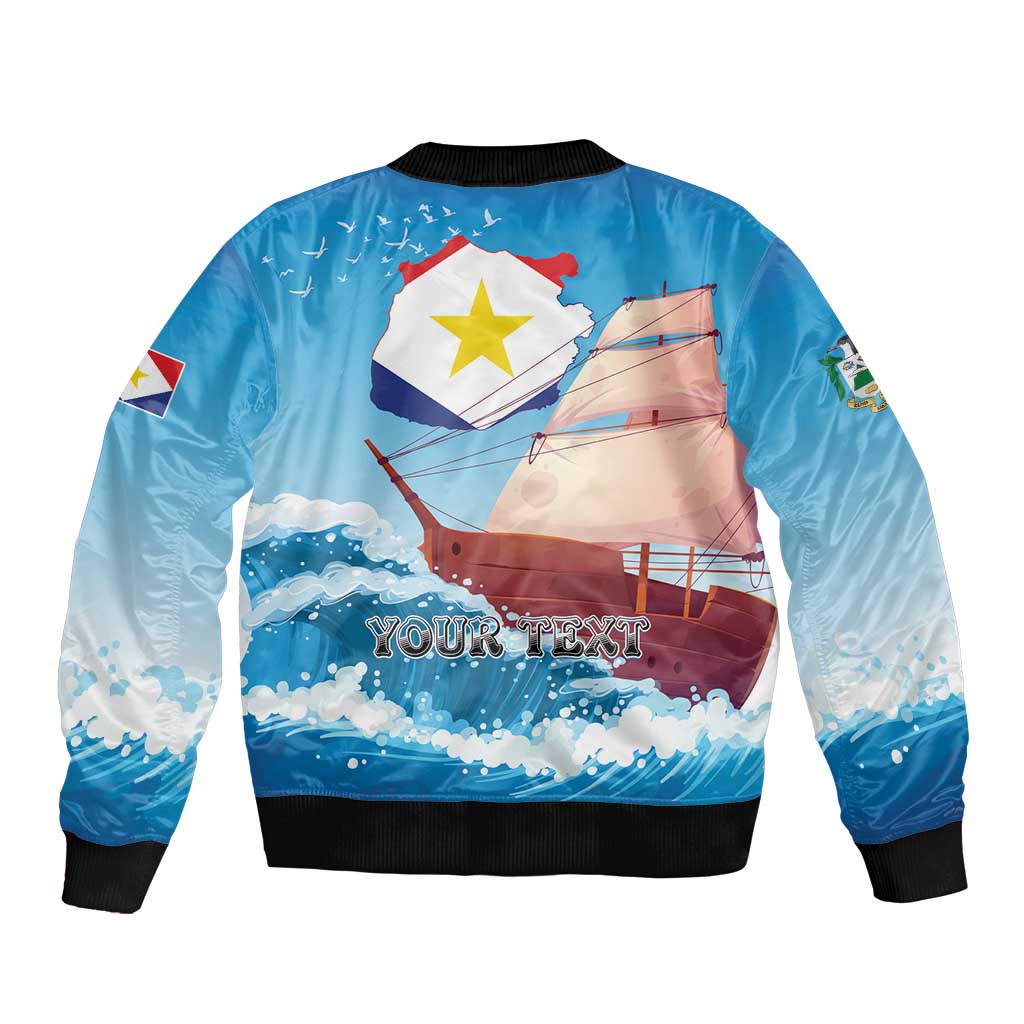 Blue bomber jacket back with sailboat, flag graphic and 'YOUR TEXT', black ribbed cuffs