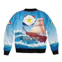 Blue bomber jacket back with sailboat, flag graphic and 'YOUR TEXT', black ribbed cuffs