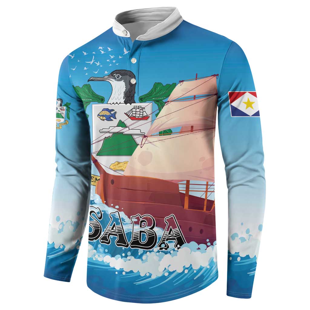 Blue button-front sweatshirt with sailboat bird graphic, 'SABA' lettering, and sleeve flag patch