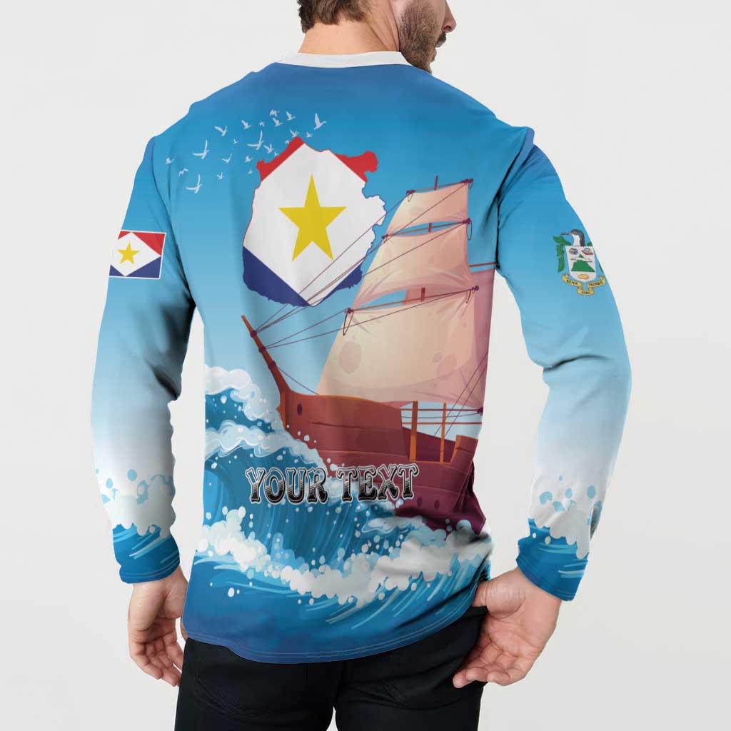 Blue button-front sweatshirt back with Saba map sailboat graphic and 'YOUR TEXT'