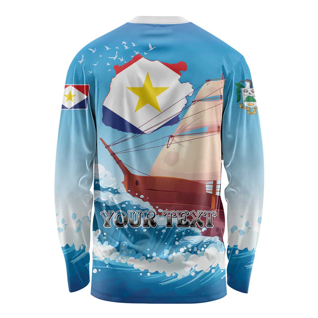 Blue long-sleeve shirt, back print with SABA map flag and 'YOUR TEXT'