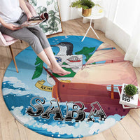 Round nautical carpet rug with sailboat and “SABA” lettering, blue wave border