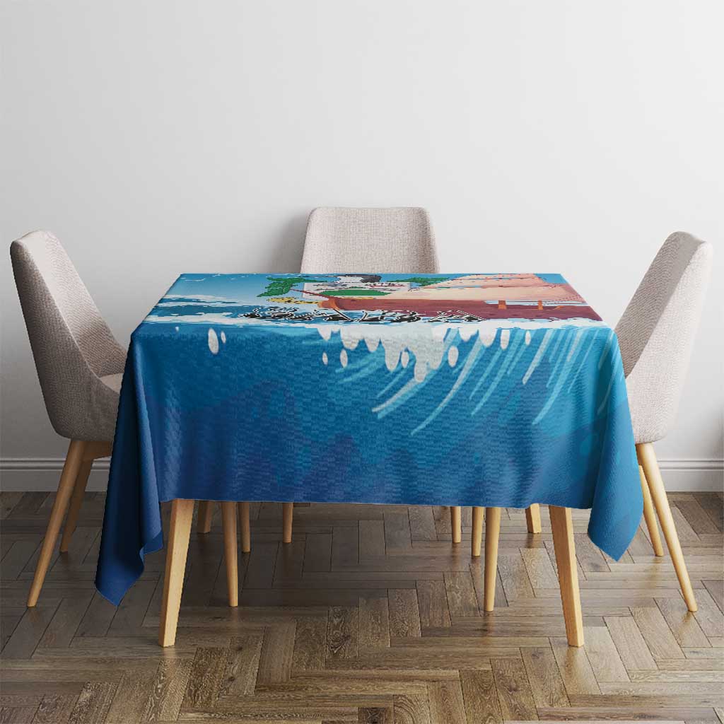 Blue sailboat tablecloth on a square table with matching chairs, wave and sailboat print
