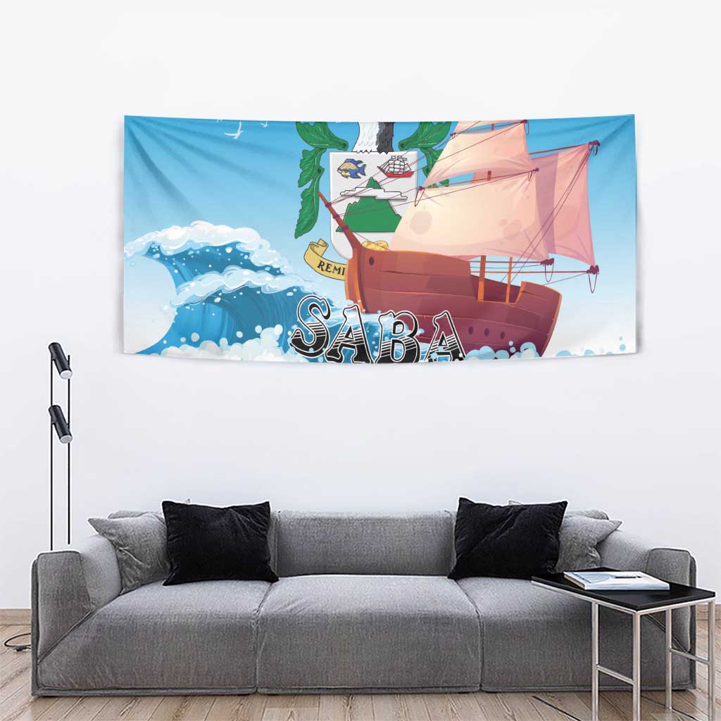 Blue tapestry wall hanging showing sailboat, waves, and “SABA” wordmark