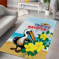 Blue area rug featuring pelican with yellow flowers and green leaves, red decorative text