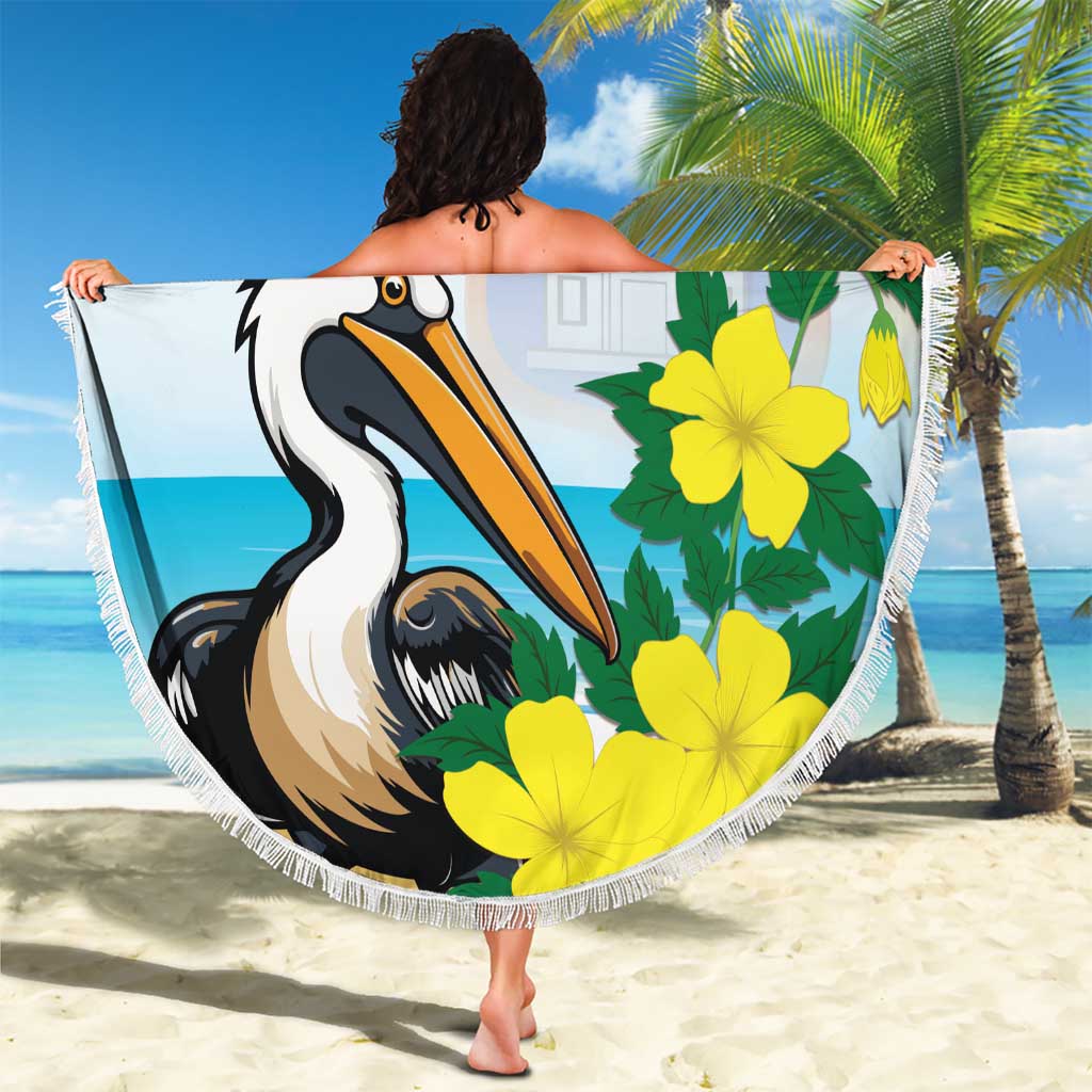 Round beach blanket with fringe, blue pelican design and yellow flowers, large 'Sint Maarten' text