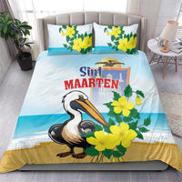 Blue duvet bedding set with pelican and yellow flower print, matching pillow pair