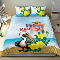 Blue bedding set with pelican, yellow blossoms, and Sint Maarten lettering on duvet