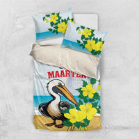 Bedding set with light blue duvet and two pillowcases, pelican and yellow flower print