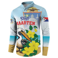 Light blue button sweatshirt front view with Sint Maarten crest, pelican, and flowers